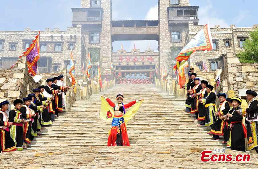 People of the Qiang ethnic group celebrate Wari'ezu Festival in Maoxian County, Southwest China's Sichuan Province, June 12, 2013. For thousands of years, there has been a convention among Qiang people, namely, to offer sacrifices to Sister Salang, the Goddess of Dance and Song. Every three years, Qiang people will get together and hold Wari'ezuconventional activities from May 3rd to May 5th in the lunar calendar. Since it is the only convention for Qiang females, it is also named by local people as Women's Day. (CNS/An Yuan)