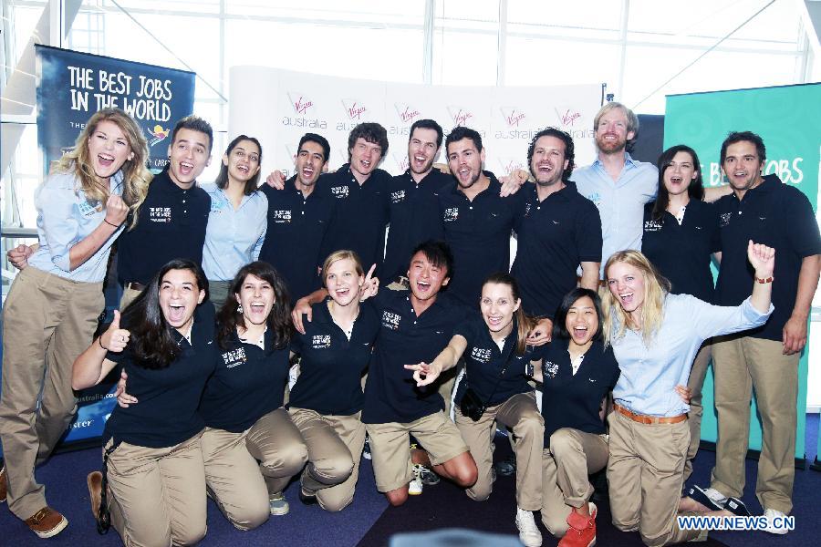 Finalists from 12 countries and regions pose for photos at the airport in Sydney, Australia, June 13, 2013. A total of 18 finalists arrived in Sydney Thursday, competing for the Best Jobs in the World including the Chief Funster in New South Wales, Lifestyle Photographer in Melbourne, Outback Adventurer in Northern Territory, Park Ranger in Queensland, Taste Master in Western Australia, and Wildlife Caretaker in South Australia. (Xinhua/Jin Linpeng) 