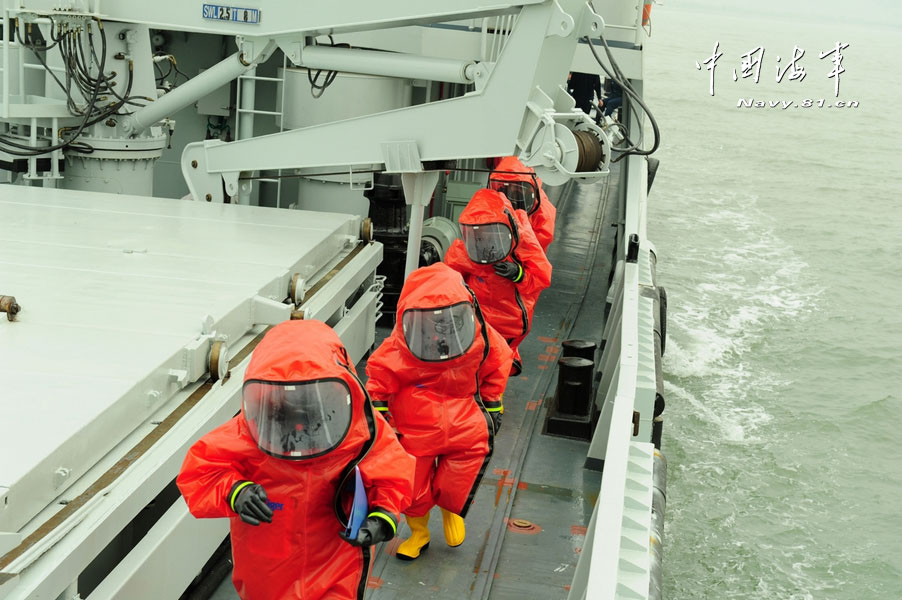 China's first maritime NBC emergency rescue team under a submarine base of the North Sea Fleet of Chinese navy conducts training in a sea area. The training subjects included real-time monitoring, sample collection and analysis and contaminated areas delineation. (China Military Online/Yu Hang, Yu Haitao)