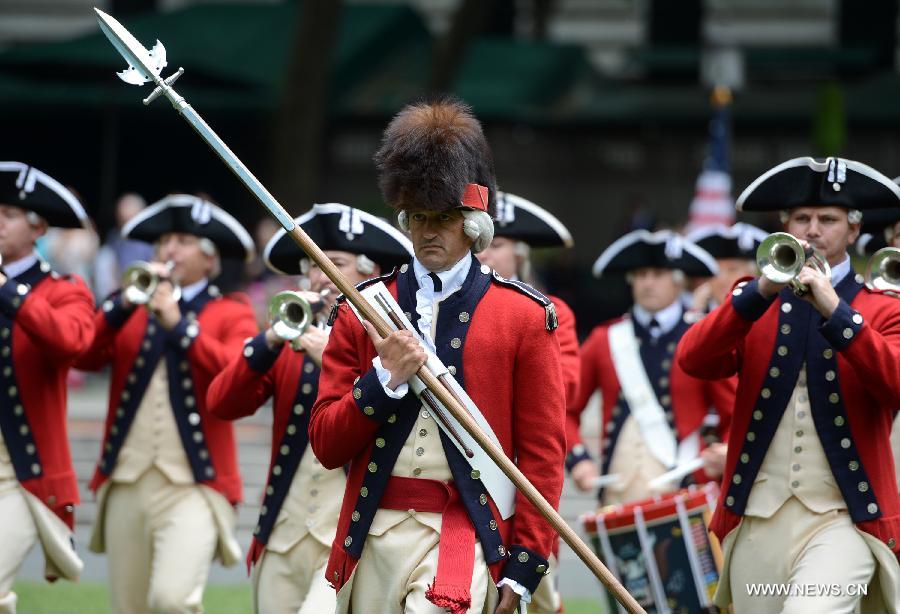 Drum Corps members attend United States Army 238th Birthday Celebration during the Army Week which made up of veterans, reservists, military spouses and committed community members, in New York, the United States, June 14, 2013. (Xinhua/Wang Lei)