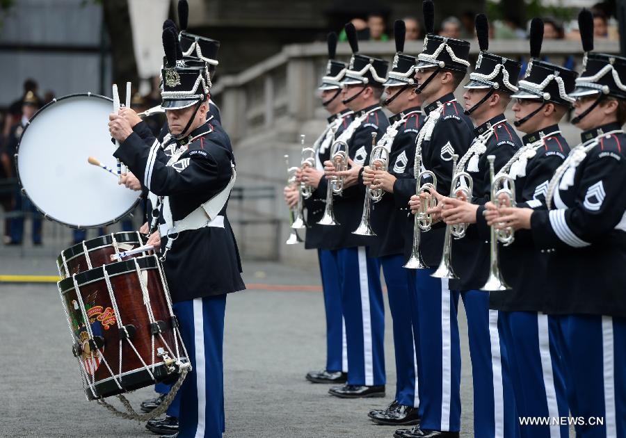 Drum Corps members attend United States Army 238th Birthday Celebration during the Army Week which made up of veterans, reservists, military spouses and committed community members, in New York, the United States, June 14, 2013. (Xinhua/Wang Lei)