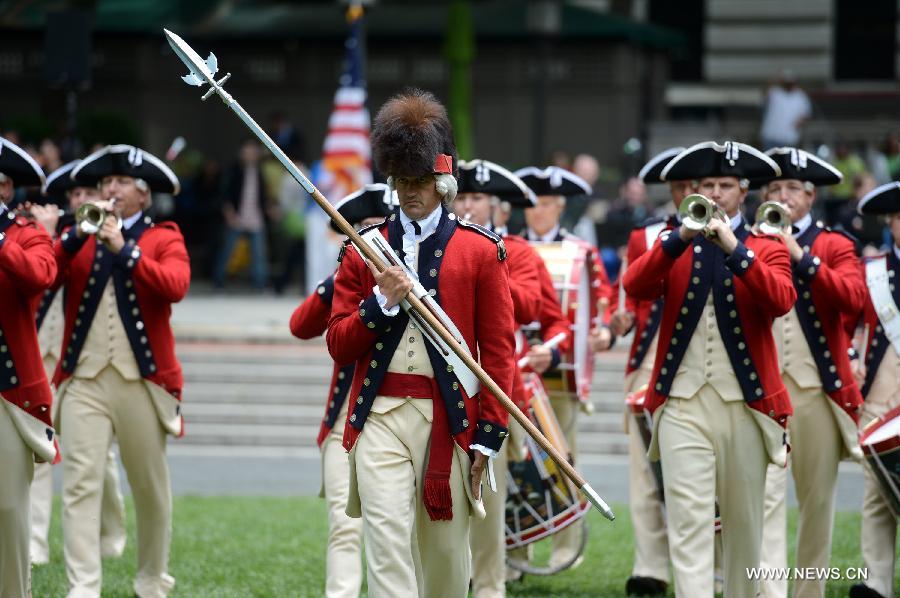 Drum Corps members attend United States Army 238th Birthday Celebration during the Army Week which made up of veterans, reservists, military spouses and committed community members, in New York, the United States, June 14, 2013. (Xinhua/Wang Lei)