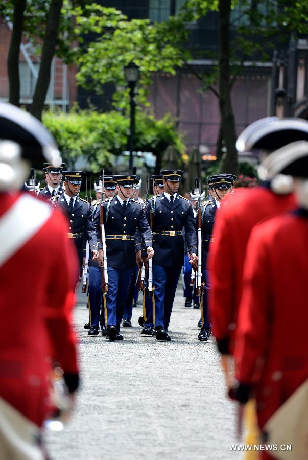 Drum Corps members attend United States Army 238th Birthday Celebration during the Army Week which made up of veterans, reservists, military spouses and committed community members, in New York, the United States, June 14, 2013. (Xinhua/Wang Lei)