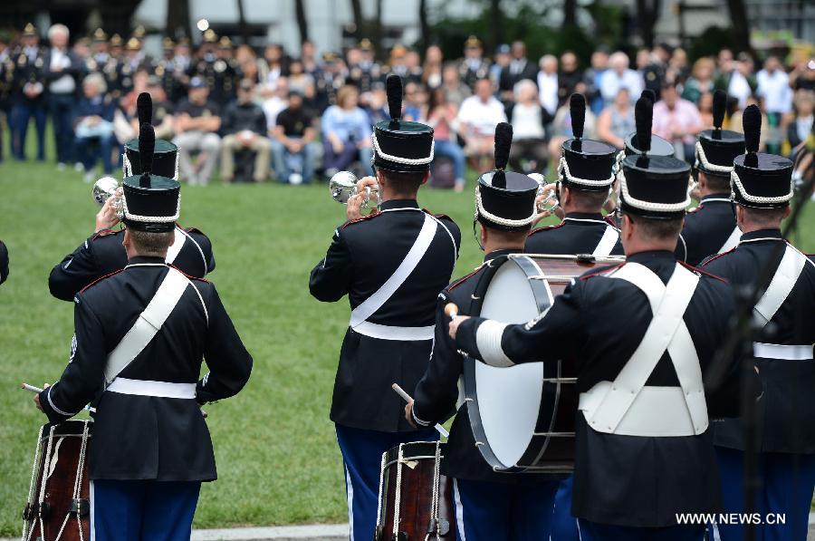 Drum Corps members attend United States Army 238th Birthday Celebration during the Army Week which made up of veterans, reservists, military spouses and committed community members, in New York, the United States, June 14, 2013. (Xinhua/Wang Lei)