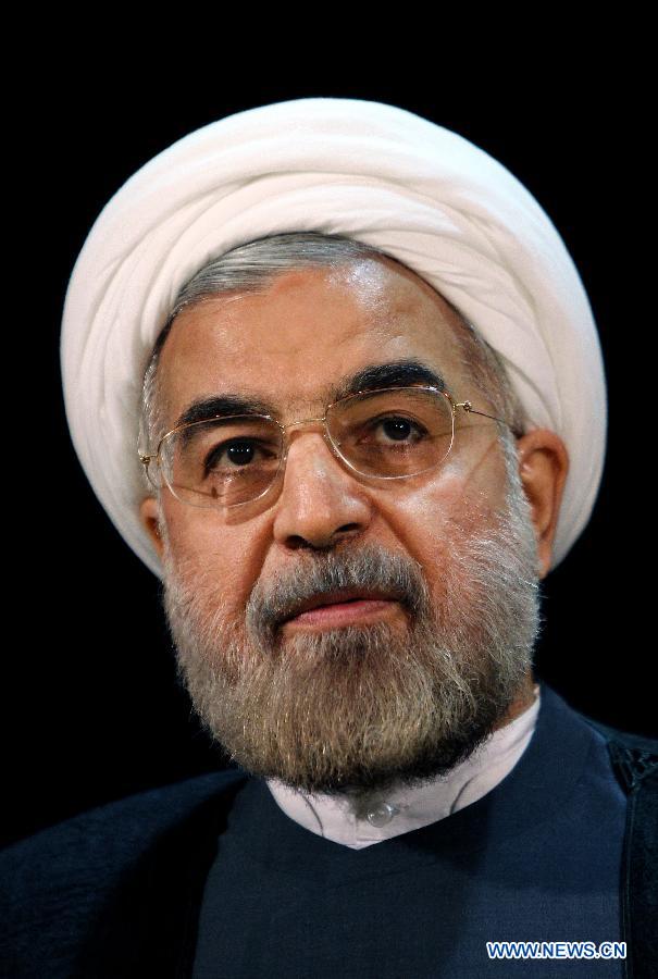 File photo taken on May 7, 2013 shows Iran's former nuclear negotiator Hassan Rouhani reacting at a press conference after registration for Iran's 11th presidential election at the interior ministry in Tehran. Hassan Rouhani defeated his rival conservative candidates in Iran's 2013 presidential election Saturday by gaining 18,613,329 votes out of counted votes of 36,704,156, accounting for 50.7 percent of all the votes, with a turnout rate of 72.2 percent. (Xinhua/Ahmad Halabisaz) 