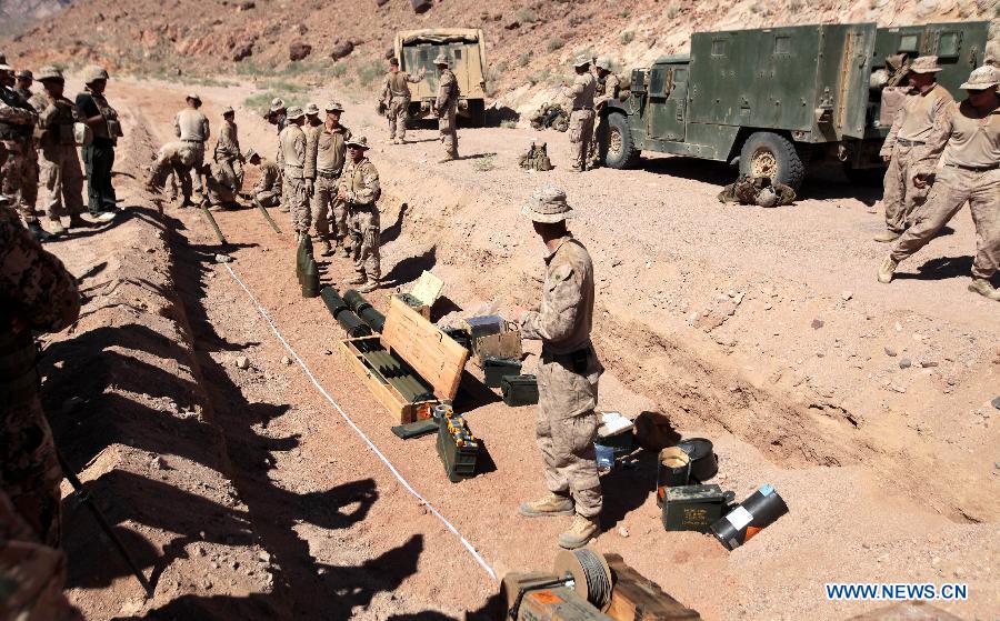 U.S. soldiers particiapte in the multinational training military exercise, codenamed Eager Lion, at the city of Quweira, 290 km south of Amman, Jordan, on June 16, 2013. (Xinhua/Mohammad Abu Ghosh)