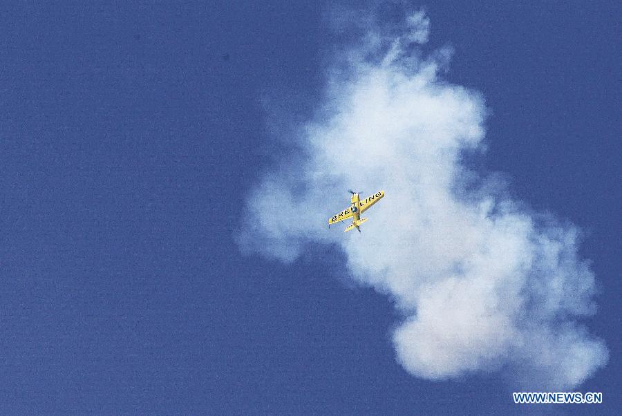 A Breitling aircraft performs during the 50th International Paris Air Show at the Le Bourget airport in Paris, France, June 17, 2013. The Paris Air Show runs from June 17 to 23. (Xinhua/Gao Jing) 