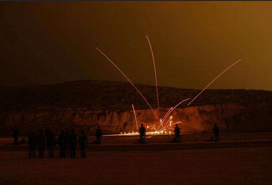 A regiment under the Lanzhou Military Area Command (MAC) of the Chinese People's Liberation Army (PLA) organizes its troops to carry out a comprehensive live-ammunition drill in an unfamiliar field. (China Military Online/Zhang Yaokun)