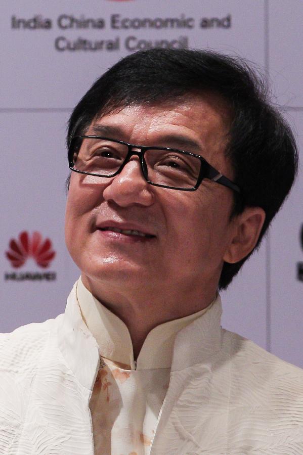 Actor Jackie Chan attends the news conference of the Chinese film festival in New Delhi, India, on June. 18, 2013. The 5-day festival opened on Tuesday to boost bilateral movie and culture cooperation between China and India.(Xinhua/Zheng Huansong) 