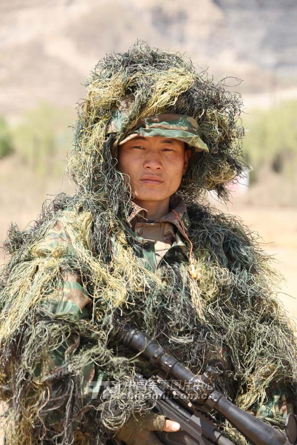 A member of the shooting team of the Chinese People's Liberation Army (PLA) is in the 2013 Australian Army Skills at Arms Meeting (AASAM). (China Military Online/Zhang Kunping, Zhou Rui, Wen Chunhua, Liu Zhanqing)