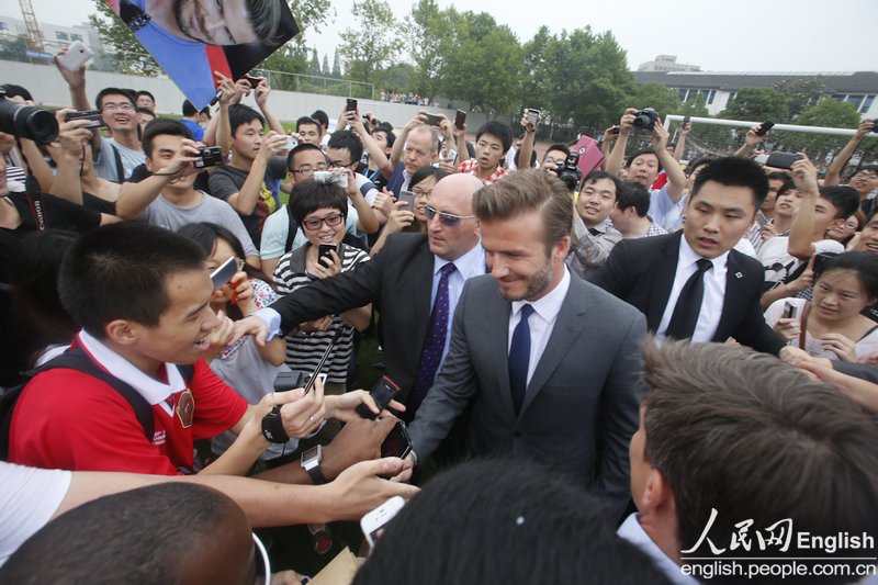 Beckham visits Shanghai as ambassador to the Chinese Super League, and his appearance in Tongji University on Thursday ignites crowd stampede, leaving at least five people injured. (Photo/CFP) 