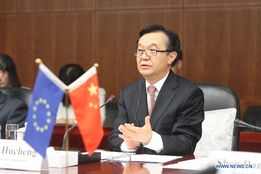 Gao Hucheng, Chinese minister of commerce, addresses the 27th China-European Union (EU) Economic and Trade Joint Committee meeting in Beijing, capital of China, June 21, 2013. The meeting was held here on Friday. (Xinhua/Xing Guangli)
