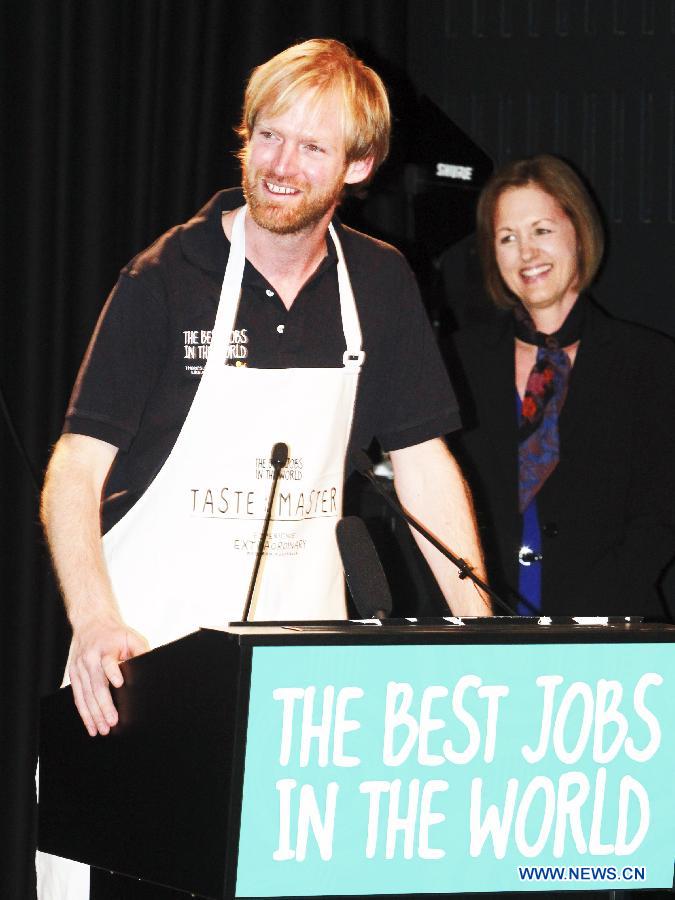 Rich Keam (L) from the United Kingdom speaks after winning the job 'Taste Master in Western Australia' in Sydney, Australia, on June 21, 2013. Six young men and women have beaten off more than 330,000 competitors from 196 countries and regions to be awarded Tourism Australia's 'Best Jobs in the World'. They are expected to commence their jobs between August and December 2013. Tourism Australia's 'Best Jobs in the World' competition is part of a major international marketing push to promote tourism opportunities provided by Australia's Working Holiday Maker program. (Xinhua/Jin Linpeng)