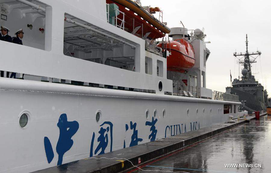 China's search and rescue vessel "Haixun 01" docks at the port in Sydney, Australia, June 22, 2013. China's largest search-and-rescue vessel "Haixun 01" arrived at Sydney's Garden Island port Saturday on its first international voyage. (Xinhua/Jin Linpeng) 