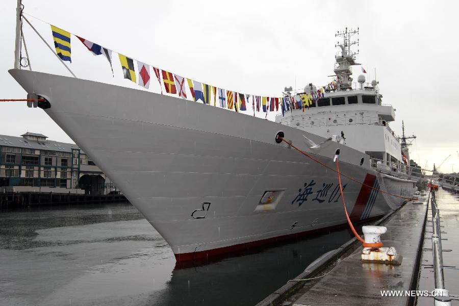 China's search and rescue vessel "Haixun 01" docks at the port in Sydney, Australia, June 22, 2013. China's largest search-and-rescue vessel "Haixun 01" arrived at Sydney's Garden Island port Saturday on its first international voyage. (Xinhua/Jin Linpeng) 