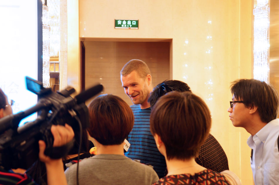 Dutch conceptual artist, Rubber Duck's "papa" Florentijin Hofman attends a press meeting in Beijing, June 22, 2013. As a special present given by BJDW's guest city Amsterdam, the Rubber Duck project will visit Beijing this September and stay for about one month. BJDW will be held from Sept. 26 to Oct. 3 in Beijing. (People's Daily Online/Chen Lidan) 