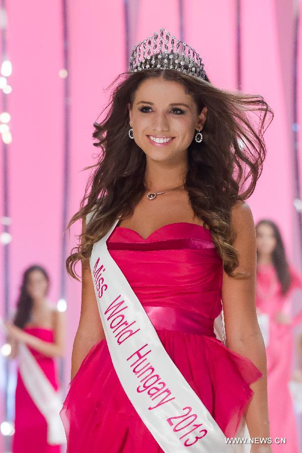 Annamaria Rakosi of Hungary is crowned as the winner of the Miss World Hungary in a beauty contest held in Budapest, Hungary on June 22, 2013. Miss World Hungary, Miss Universe Hungary and Miss Intercontinental Hungary were chosen in the beauty contest hosted by Hungary's tv2. (Xinhua/Attila Volgyi)