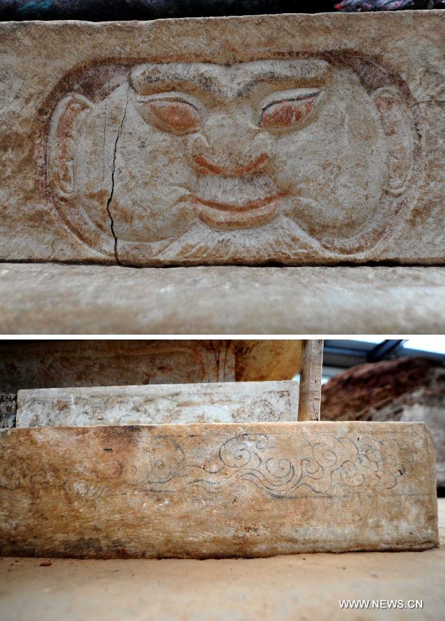 Combination photo taken on June 22, 2013 shows carvings on a stone coffin bed at the archeological site of an ancient tomb in Fangshan District of Beijing, capital of China. A gravestone excavated from the tomb confirmed that the tomb was the final resting place of Liu Ji, a regional military governor of the Tang Dynasty (618-907), and his wife. Archaeologists have started a salvage excavation of the tumulus since August 2012, after it was accidentally discovered at a local construction site. Valuable cultural relics, including an exquisite stone coffin bed, were discovered. (Xinhua/Luo Xiaoguang) 