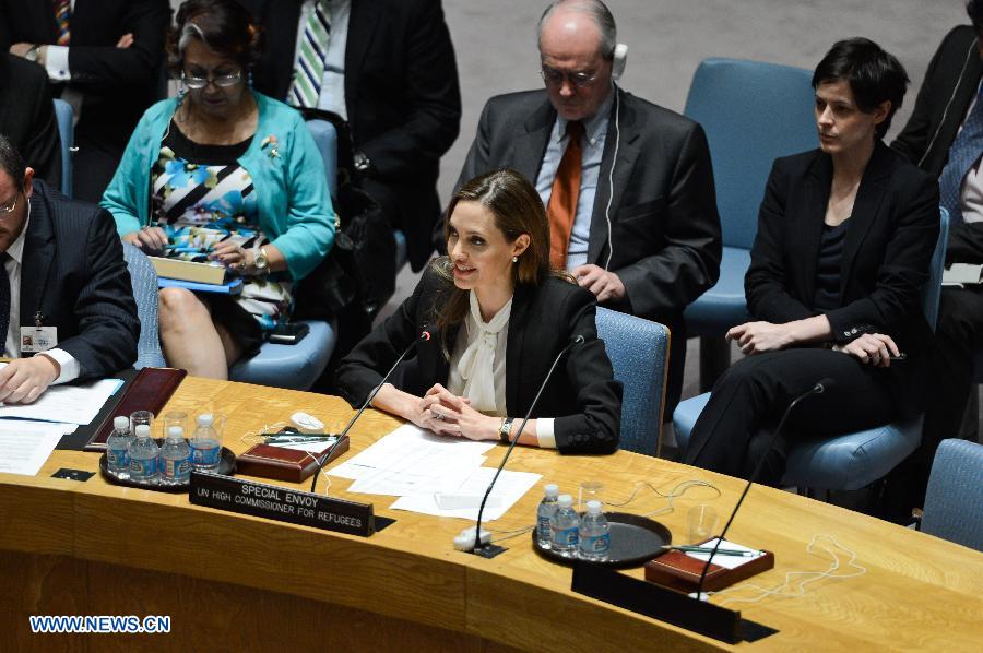 Actress Angelina Jolie (front R), the Special Envoy of the United Nations High Commissioner for Refugees (UNHCR), attends a UN Security Council meeting at the UN headquarters in New York, on June 24, 2013. Jolie on Monday urged the UN Security Council to tackle sexual violence in war zones, promoting strong actions from the international community on this issue. (Xinhua/Niu Xiaolei)