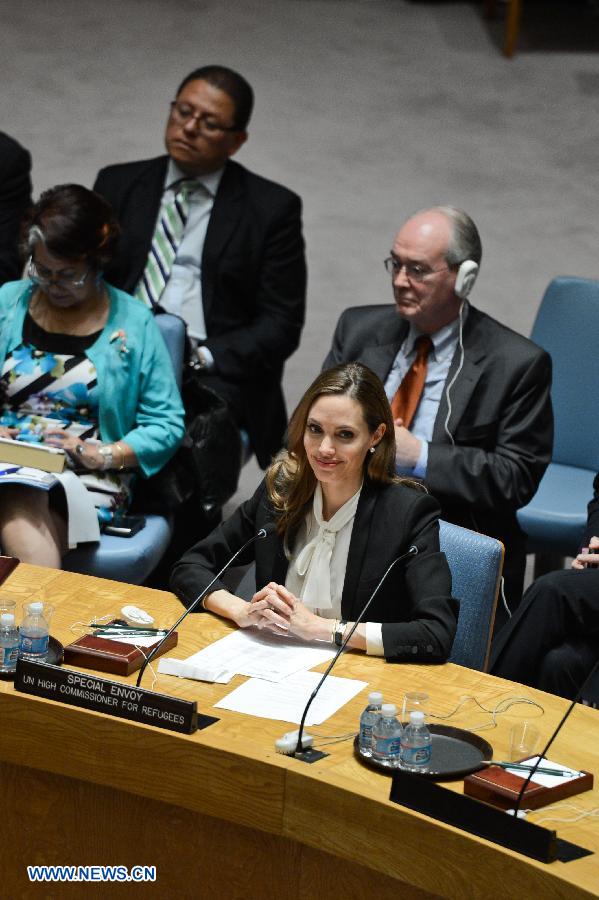 Actress Angelina Jolie (front R), the Special Envoy of the United Nations High Commissioner for Refugees (UNHCR), attends a UN Security Council meeting at the UN headquarters in New York, on June 24, 2013. Jolie on Monday urged the UN Security Council to tackle sexual violence in war zones, promoting strong actions from the international community on this issue. (Xinhua/Niu Xiaolei)