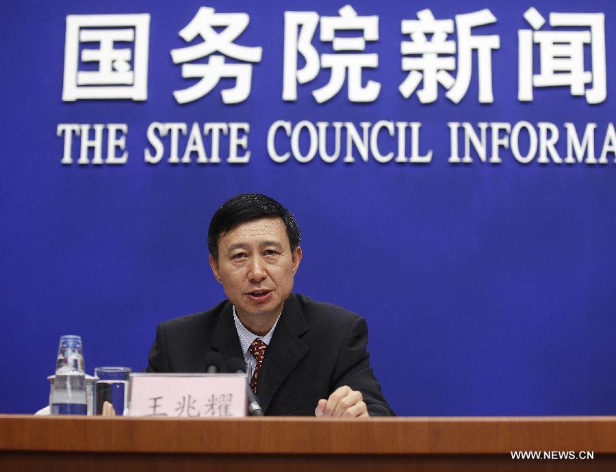 Wang Zhaoyao, director of China's manned space program office, answers questions at a press conference held by the State Council (Cabinet) Information Office in Beijing, capital of China, June 26, 2013. The re-entry capsule of China's Shenzhou-10 spacecraft landed successfully on Wednesday in north China's Inner Mongolia Autonomous Region, with three astronauts aboard safe and sound. The press conference was held to introduce the 15-day Shenzhou-10 mission. (Xinhua/Wang Shen)