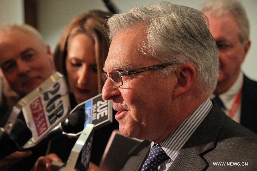 Australian Labor Party Returning Officer Chris Hayes announces that former leader Kevin Rudd has won the caucus ballot over incumbent Prime Minister Julia Gillard at Parliament House in Canberra, Australia, June 26, 2013. Kevin Rudd was sworn in as prime minister of Australia on June 27 following his victory in a ruling Labor party caucus ballot the evening before. (Xinhua/Justin Qian) 