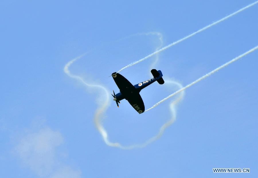 An old-fashioned Hawker Sea Fury fighter plane performs during the Airpower 13 air show in Zeltweg, Steiermark of Austria, June 28, 2013. (Xinhua/Qian Yi) 