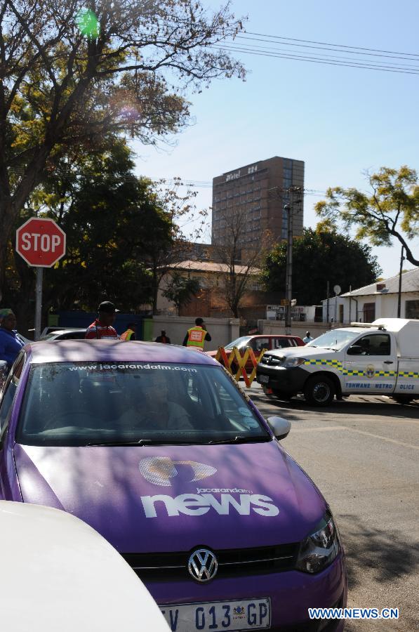 Media vehicles, tents and equipments are seen outside the hospital where South Africa's anti-apartheid icon Nelson Mandela gets medical treatment in Pretoria, South Africa, on June 28, 2013. Mandela's condition continues to improve, Mandela's ex-wife Winnie Madikizela-Mandela said on Friday. (Xinhua/Guo Xinghua) 