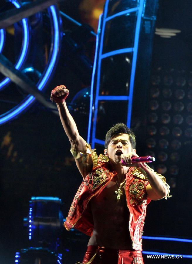 Taiwan singer Jay Chou performs during his concert in Wuhan, capital of central China's Hubei Province, June 29, 2013. (Xinhua) 