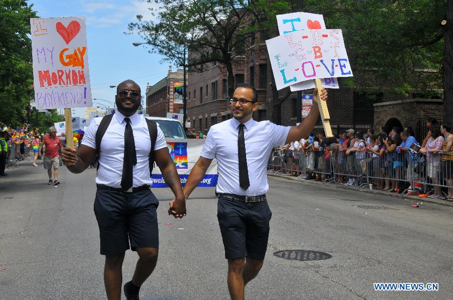 People participate in the annual Gay Pride Parade in Chicago, the United States, June 30, 2013. (Xinhua/Jiang Xintong) 