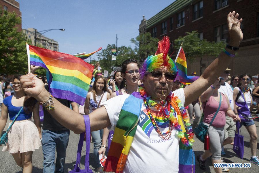 People participate in the annual Gay Pride Parade in Chicago, the United States, June 30, 2013. (Xinhua/Jiang Xintong) 