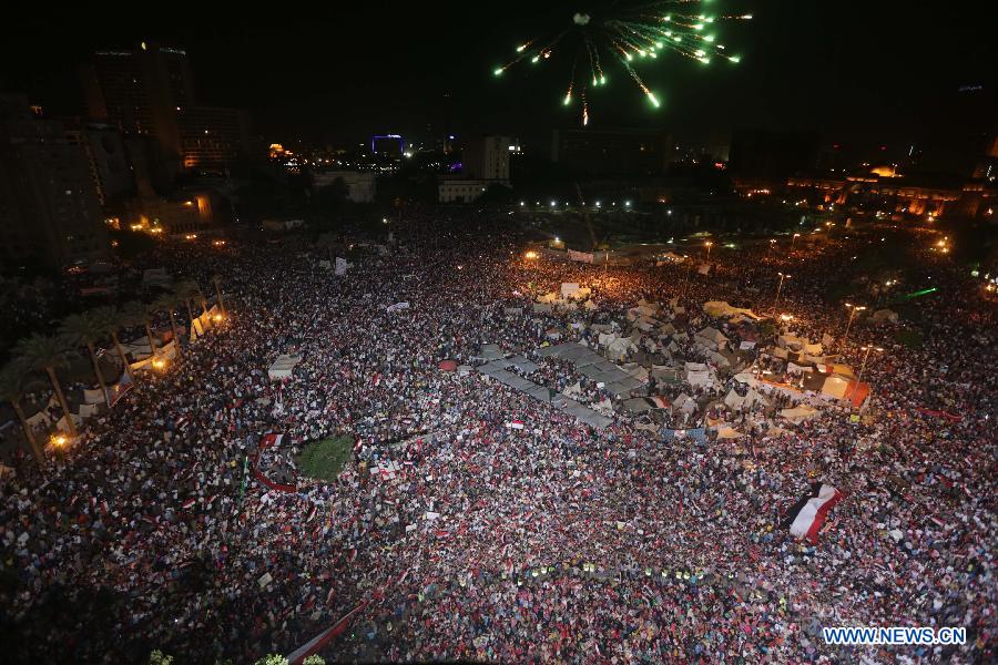 Egyptian anti-President Mohammed Morsi protesters gather during a rally at Tahrir Square in Cairo, July 1, 2013. The Egyptian military issued a statement hours ago, giving "all parties" a 48-hour deadline to respond to the demands of the people, has been seen by security and political experts as necessary to resolve the current political crisis in the turmoil-stricken country. (Xinhua/Wissam Nasser)