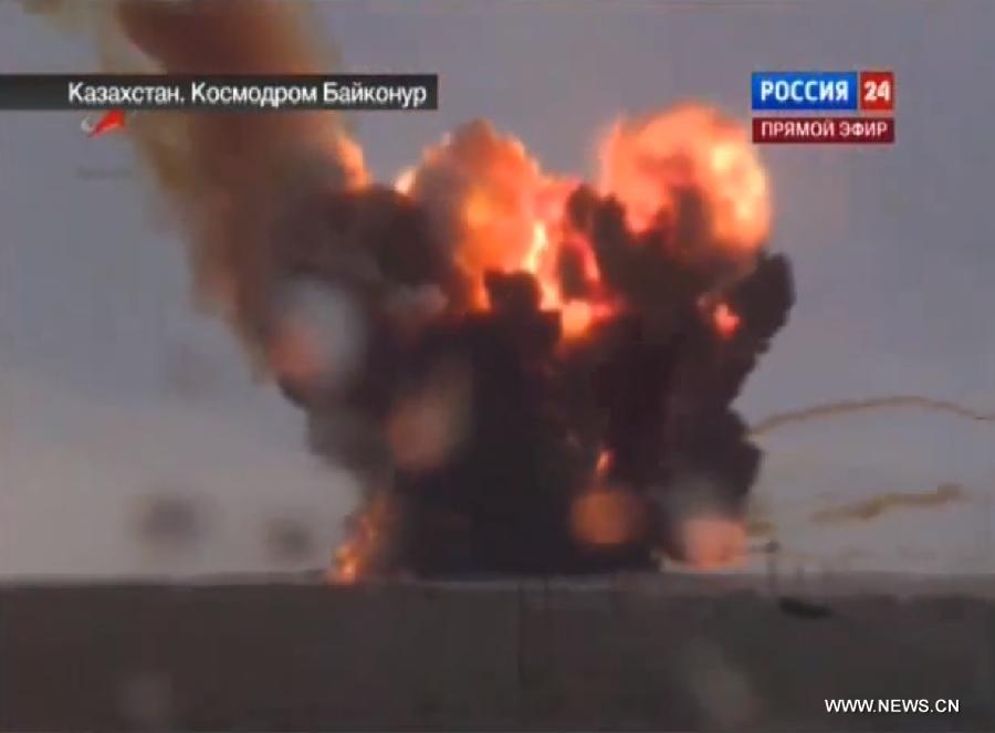 The TV grab taken from Russia 24 state TV channel on July 2, 2013 shows the Proton-M rocket crashing after blasting off from the Baikonur Cosmodrome in Kazakhstan. A Proton-M rocket crashed one minute after blasting off from the Baikonur Cosmodrome in Kazakhstan, Russia's federal space agency Roscosmos said Tuesday. (Xinhua)