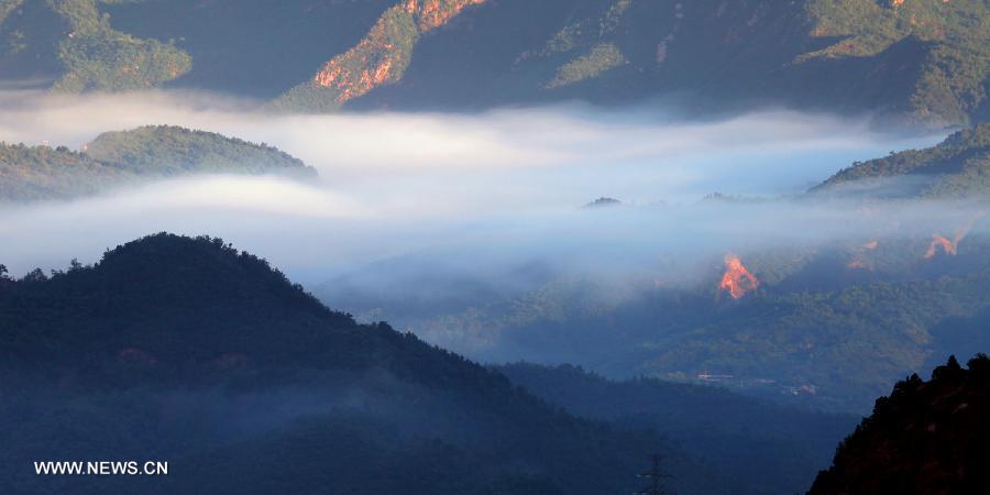 Photo taken on July 3, 2013 shows the scenery of the mountainous areas in Liulimiao Village of Huairou District, Beijing, capital of China. (Xinhua/Bu Xiangdong)  