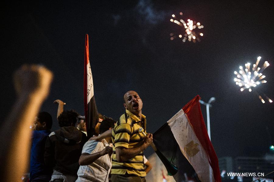 Opponents of Egyptian President Mohammed Morsi gather at Cairo's Tahrir Square, Egypt, on July 3, 2013. Egyptian interior ministry expressed complete support to a military statement that revealed a roadmap for running the country after the ouster of Islamist President Mohamed Morsi, the ministry said in a statement Wednesday. (Xinhua/Li Muzi)