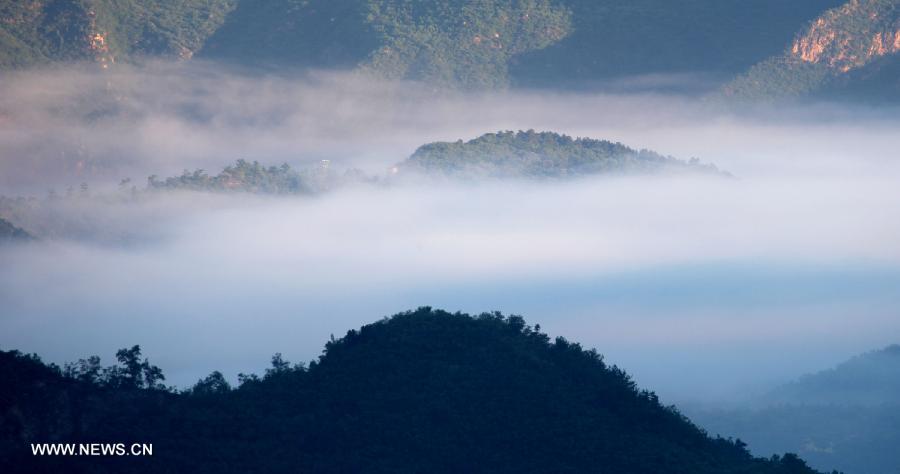 Photo taken on July 3, 2013 shows the scenery of the mountainous areas in Liulimiao Village of Huairou District, Beijing, capital of China. (Xinhua/Bu Xiangdong) 