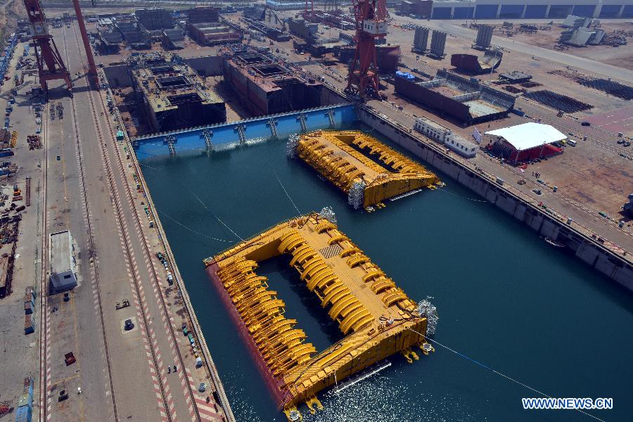 Photo taken on July 3, 2013 shows buoys of the newly-built deep-sea engineering equipment in Qingdao, east China's Shandong Province. (Xinhua/Wan Houde)