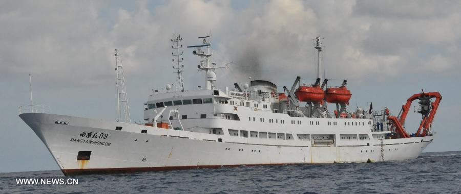 The support ship Xiangyanghong 09 of China's manned submersible Jiaolong is seen at the south China sea, July 3, 2013. The Jiaolong manned submersible on Wednesday carried out a scientific dive to conduct geological sampling on a complex terrain. (Xinhua/Zhang Xudong)