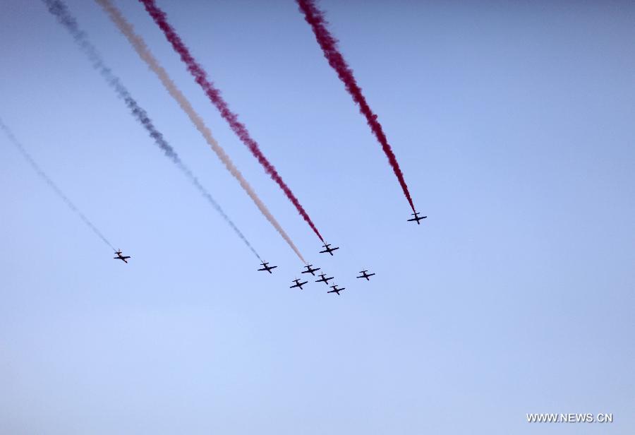 Smoke in the colors of the Egyptian national flag trails after military aircrafts over the sky of Cairo, Egypt, July 4, 2013, a day after President Mohammed Morsi was ousted. Egyptian judge Adli Mansour was sworn in Thursday as the interim president of the state after the ouster of Mohamed Morsi. Adli has taken an oath earlier in the day as head of the Supreme Constitutional Court (SCC). (Xinhua/Wissam Nassar) 