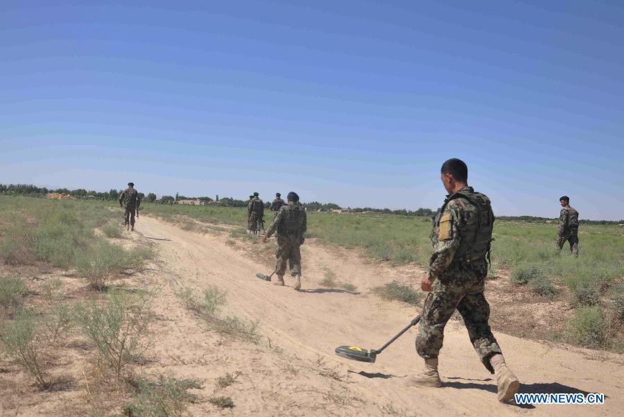 Afghan army soldiers are seen during an operation against Taliban in Jauzjan in northern of Afghanistan on July 7, 2013. Afghan security forces backed by the NATO-led International Security Assistance Force (ISAF) raided a Taliban hideout in Jauzjan province 390 km north of Kabul early Sunday, killing 18 militants and injuring a dozen others, deputy to provincial governor Abdul Rahman Mahmoudi said. (Xinhua/Arui)