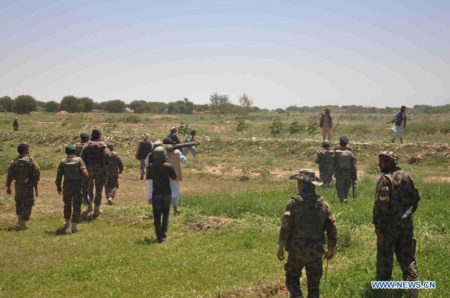 Afghan army soldiers are seen during an operation against Taliban in Jauzjan in northern of Afghanistan on July 7, 2013. Afghan security forces backed by the NATO-led International Security Assistance Force (ISAF) raided a Taliban hideout in Jauzjan province 390 km north of Kabul early Sunday, killing 18 militants and injuring a dozen others, deputy to provincial governor Abdul Rahman Mahmoudi said. (Xinhua/Arui)