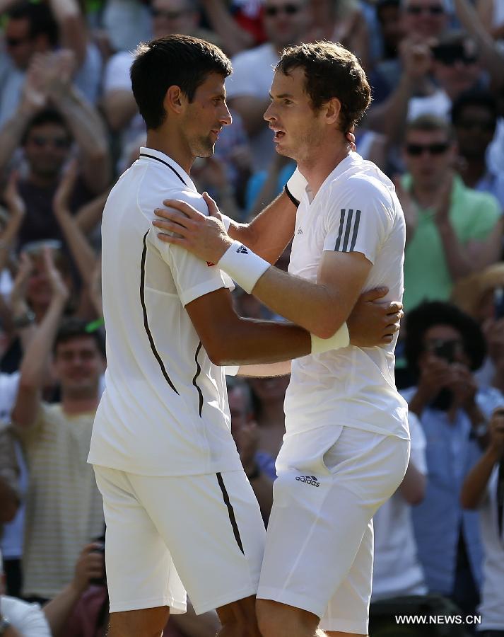 Andy Murray (R) of Britain greets Novak Djokovic of Serbia after their men's singles final match on day 13 of the Wimbledon Lawn Tennis Championships at the All England Lawn Tennis and Croquet Club in London, Britain, on July 7, 2013. Andy Murray won his first Wimbledon title and ended Britain's 77-year wait for a men's champion with a 6-4 7-5 6-4 victory over world number one Novak Djokovic. (Xinhua/Wang Lili)