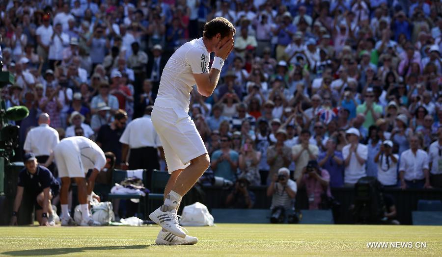 Andy Murray of Britain celebrates after winning the men's singles final match with Novak Djokovic of Serbia on day 13 of the Wimbledon Lawn Tennis Championships at the All England Lawn Tennis and Croquet Club in London, Britain, July 7, 2013. Andy Murray won his first Wimbledon title and ended Britain's 77-year wait for a men's champion with a 6-4 7-5 6-4 victory over world number one Novak Djokovic. (Xinhua/Wang Lili)