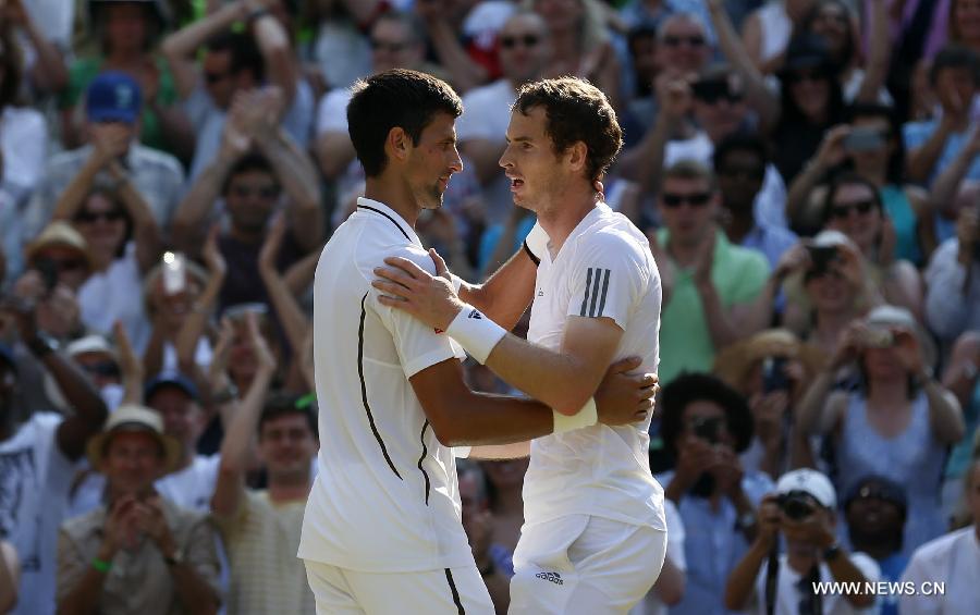 Andy Murray (R) of Britain greets Novak Djokovic of Serbia after their men's singles final match on day 13 of the Wimbledon Lawn Tennis Championships at the All England Lawn Tennis and Croquet Club in London, Britain, on July 7, 2013. Andy Murray won his first Wimbledon title and ended Britain's 77-year wait for a men's champion with a 6-4 7-5 6-4 victory over world number one Novak Djokovic. (Xinhua/Wang Lili)