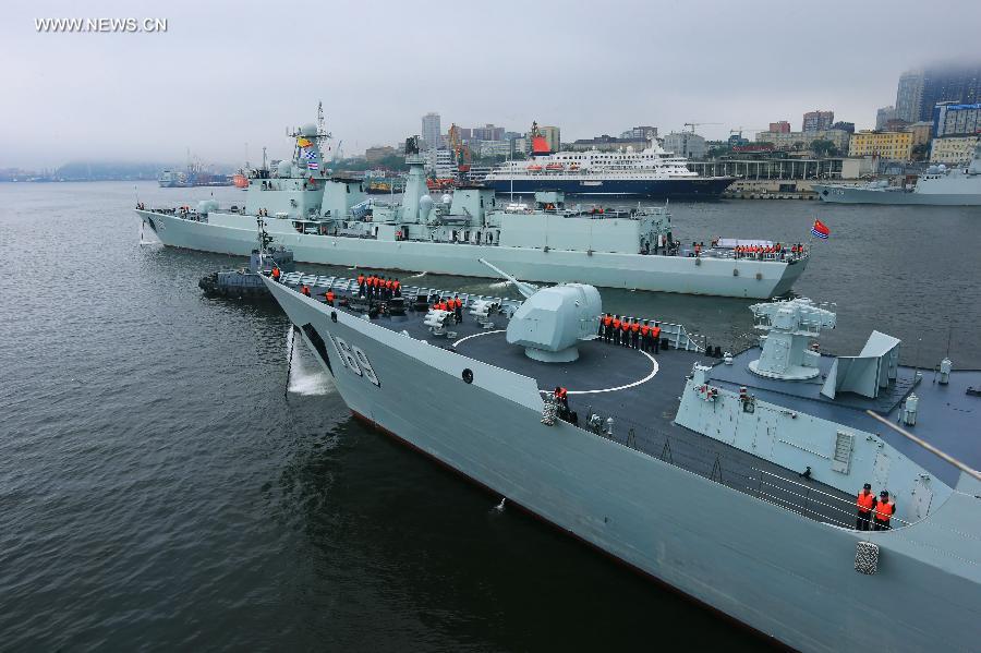 Chinese Navy vessels leave for joint naval drills from a port in Vladivostok, Russia, July 8, 2013. China and Russia started on Monday the joint naval drills off the coast of Russia's Far East. (Xinhua/Zha Chunming) 