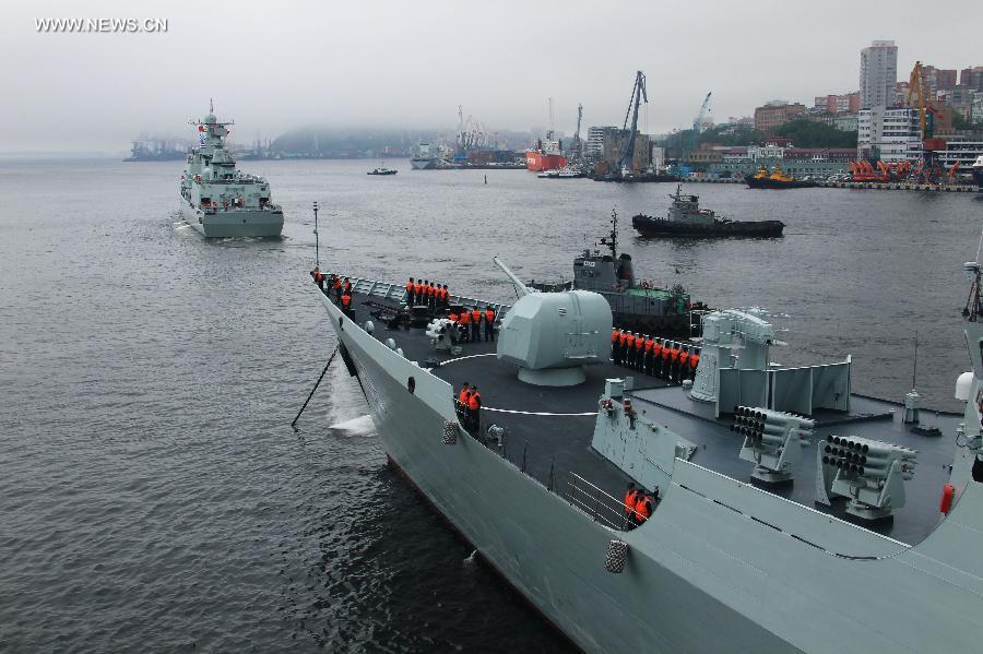 Chinese Navy vessels leave for joint naval drills from a port in Vladivostok, Russia, July 8, 2013. China and Russia started on Monday the joint naval drills off the coast of Russia's Far East. (Xinhua/Zha Chunming) 