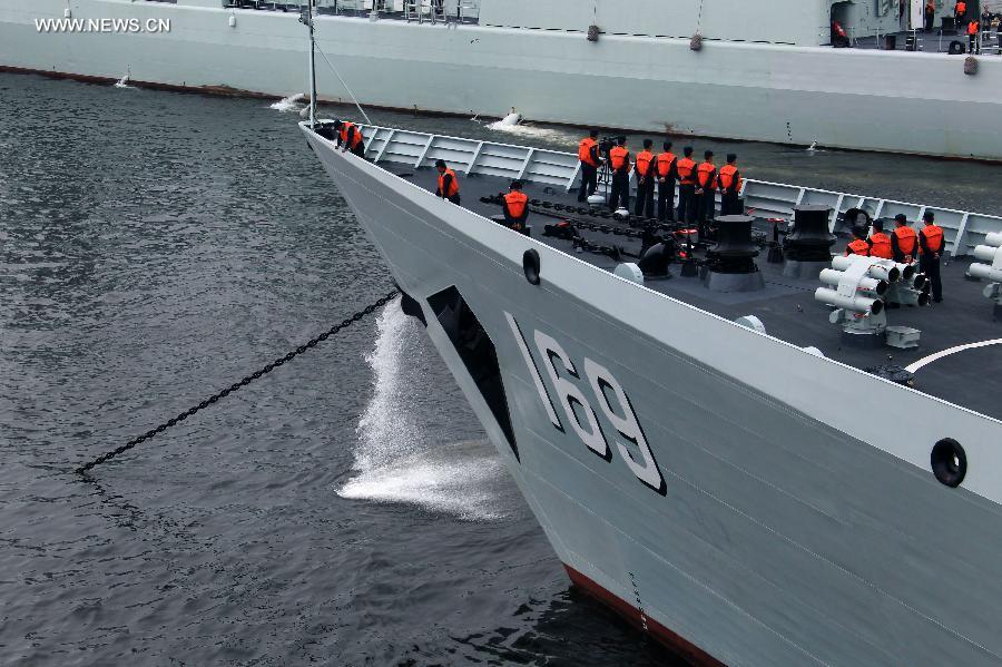 A Chinese Navy vessel leaves for joint naval drills from a port in Vladivostok, Russia, July 8, 2013. China and Russia started on Monday the joint naval drills off the coast of Russia's Far East. (Xinhua/Zha Chunming) 