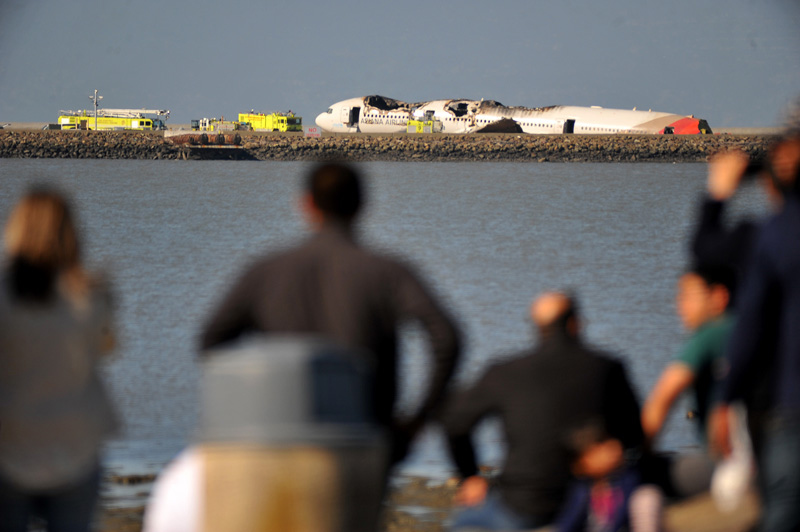 Wreckage of the crashed plane is seen at San Francisco International Airport in San Francisco, the U.S., July 6, 2013. (Xinhua/Liu Yilin)