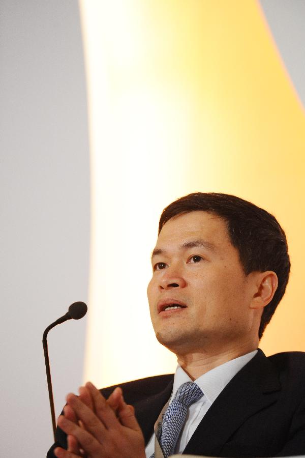 Fang Xinghai, director-general of the Shanghai Metropolitan Government's Office of Financial Services, attends the Future China Global Forum in Singapore, July 8, 2013. (Xinhua/Then Chih Wey) 