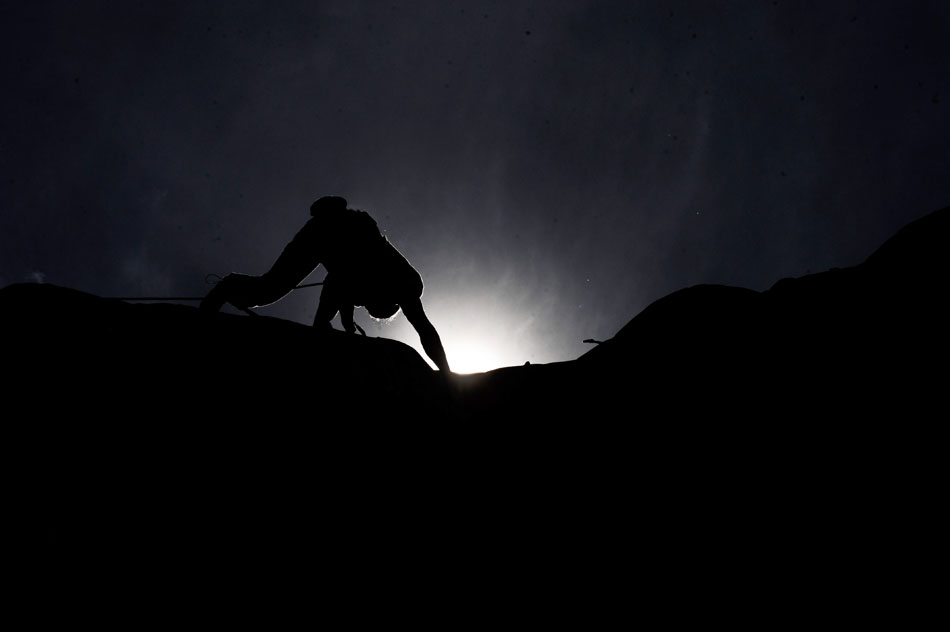 A photo taken on July 3, 2013 shows a climber competing in the national rock climbing competition in Tibet. (Photo/Xinhua) 